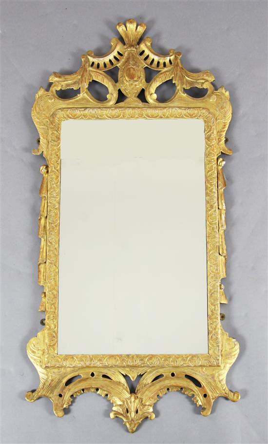 A George II carved and giltwood wall mirror, possibly Irish, W.1ft 11in. H.3ft 10in.